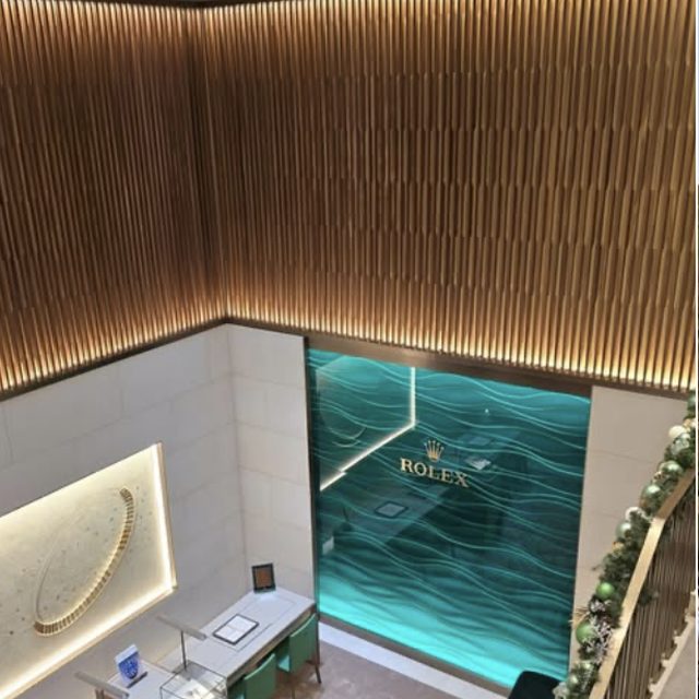 Luxury retail fit-out — feature lighting and washroom install.